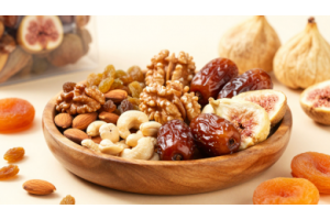 Premium dried fruits collection by HimalayanBits including almonds, walnuts, cashews, raisins, dates, figs, and apricots arranged in a healthy natural display.