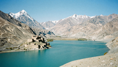 Scenic view of Hunza Valley featuring Attabad Lake, Passu Cones, and snow-capped mountains
