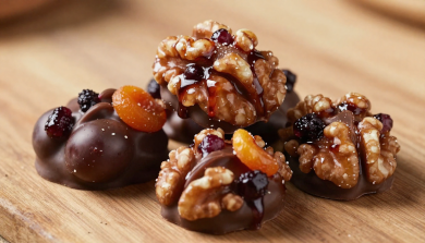 Kilaow Hunzai Chocolate made from walnuts coated with grape, apricot, and mulberry juice