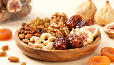 Premium dried fruits collection by HimalayanBits including almonds, walnuts, cashews, raisins, dates, figs, and apricots arranged in a healthy natural display.