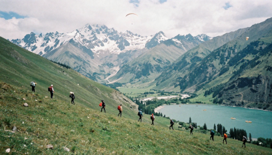 Leisure time activities in Hunza Valley including hiking, trekking, rafting, paragliding, camping, and scenic lake views